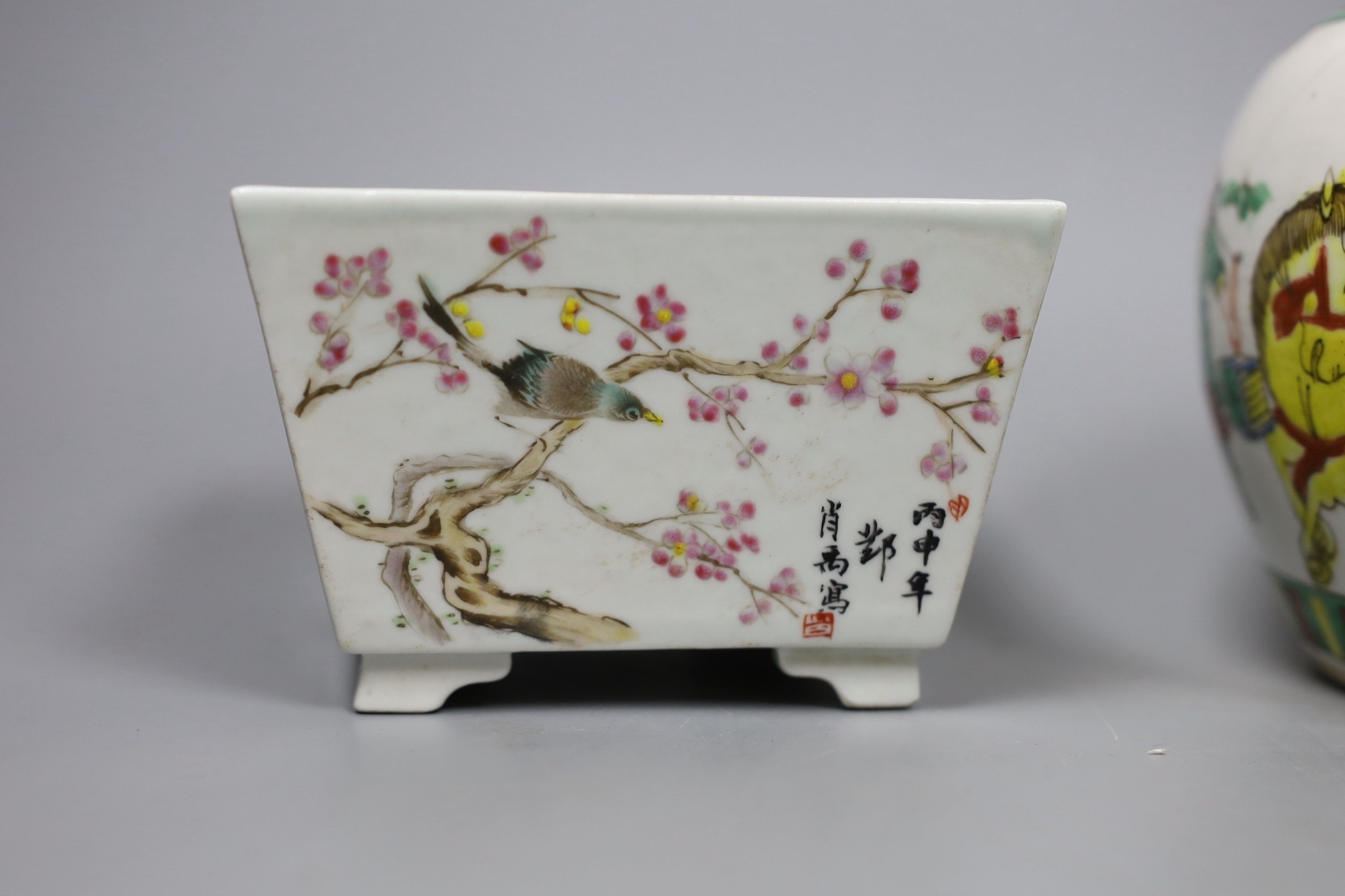 A Chinese famille verte ginger jar, together with three famille rose ceramics, a blue enamel box and cover, and a Chinese blue polychrome box (6)